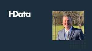 Headshot of John Savage and HData logo
